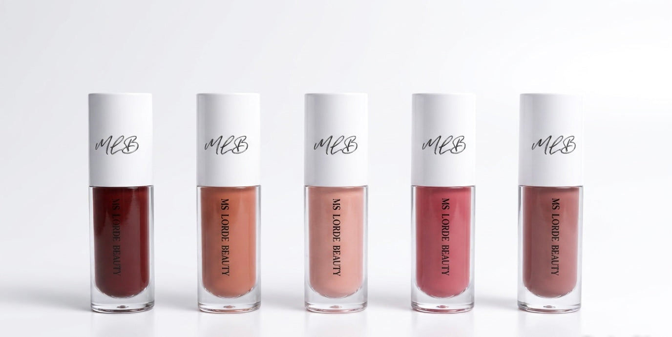 Five bottles of MBL lipstick on a white background
